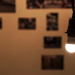 LED light bulb emitting bright light in a dark room
