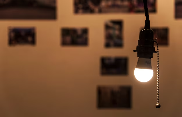 LED light bulb emitting bright light in a dark room